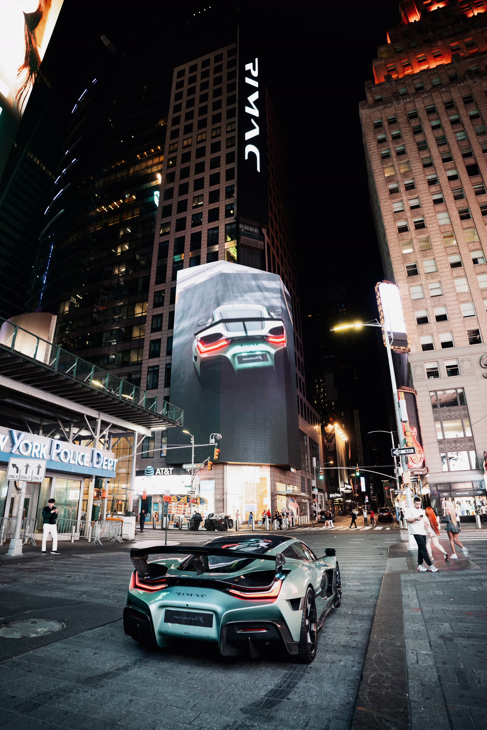 Rimac Nevera R in Times Square at night, Rimac billboard above